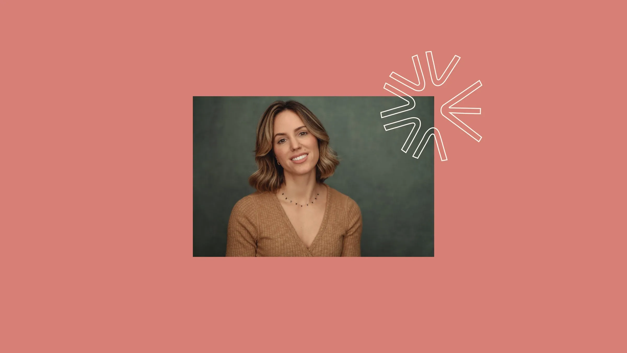 Emma Blackmore on coral, beside the starburst from her logo