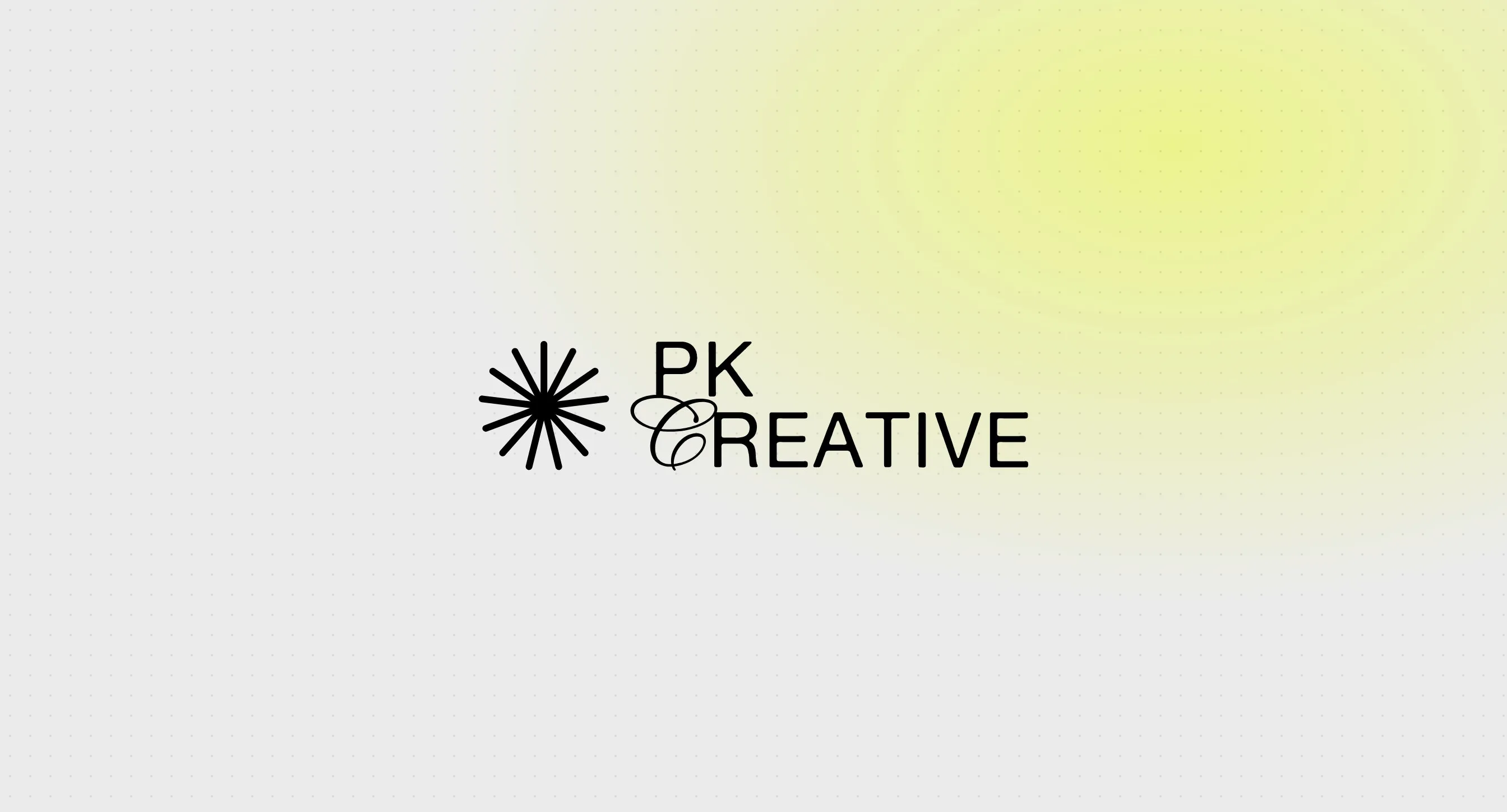 The PK Creative logo on light grey with a soft yellow glow